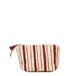 Back of the hand woven artisan Cristina Cosmetic Pouch in Cherry Red. The back has vertical red and beige stripes. It has a leather zipper pull and a red mini tassel.