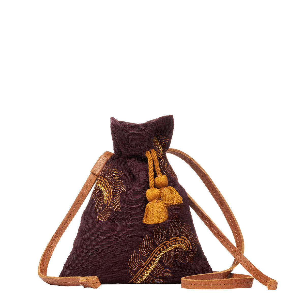 Front of the hand woven artisan Eloisa Small Crossbody in Season Sparkle. It has leather straps, an orange drawstring with tassels, and embroidered detailing.