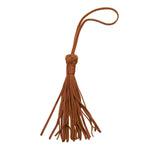Hand woven artisan Celestina Tassel in chestnut color. The dark brown tassel has small braids that tie loose ends with a loop at the top.