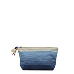 Front view of the Cristina Pouch in Ocean Breeze. It has a gradient woven pattern white to dark blue. It has a white tassel and leather zipper pull.