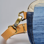 Felipa Belt Bag in Ocean Breeze. A close up of the buckle detail.
