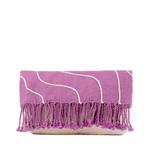 A GIF of the front and back of the hand woven artisan Margarita Clutch in Cosmic Waves.