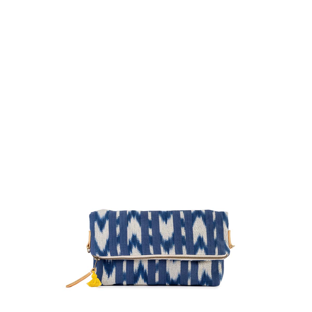 Folded hand woven artisan Florentina Clutch-to-Hobo in Atitlán Hills. It has vertical and chevron dark blue and white stripes. A yellow mini tassel and leather zipper pull is attached.