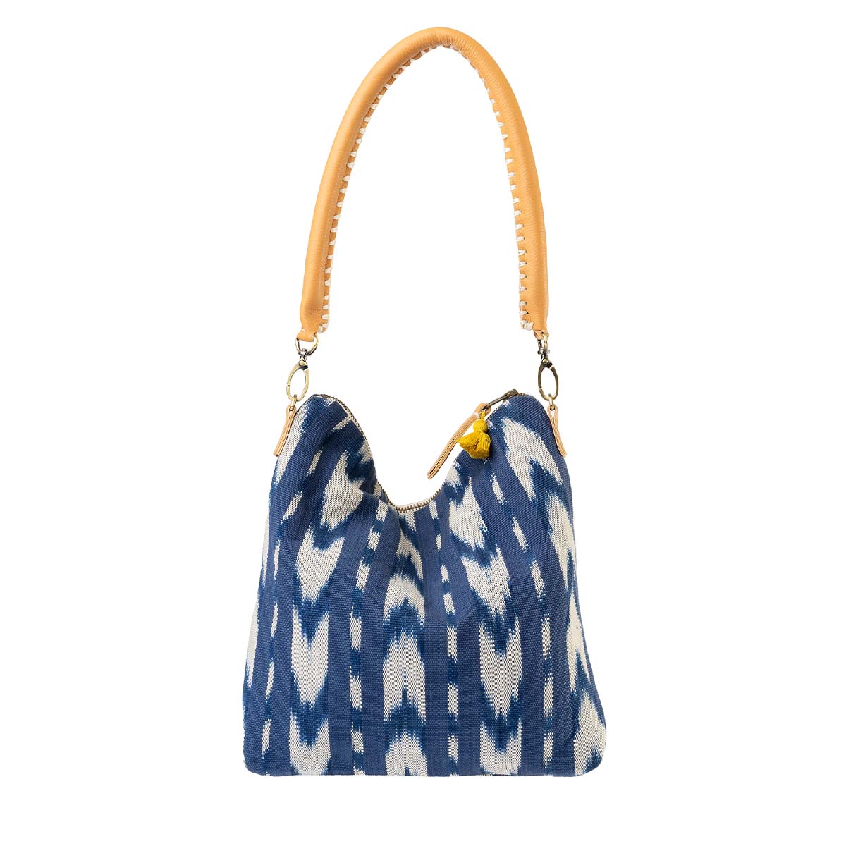 Unfolded artisan hand woven Florentina Clutch-to-Hobo in Atitlán Hills with leather handle, mini tassel, and leather zipper pull. It has vertical and chevron dark blue and white stripes. 