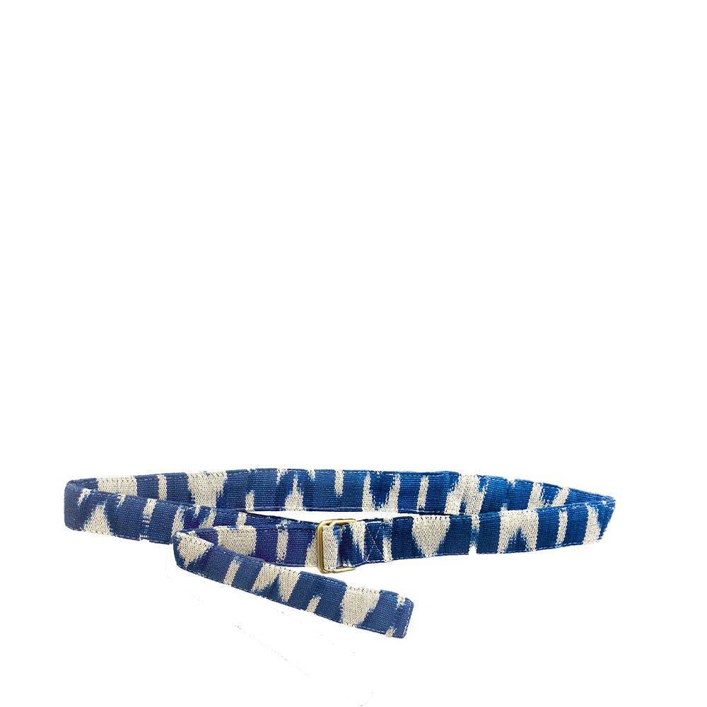The Celeste Belt in Atitlán Hills pattern. It has vertical and chevron dark blue and white stripes.