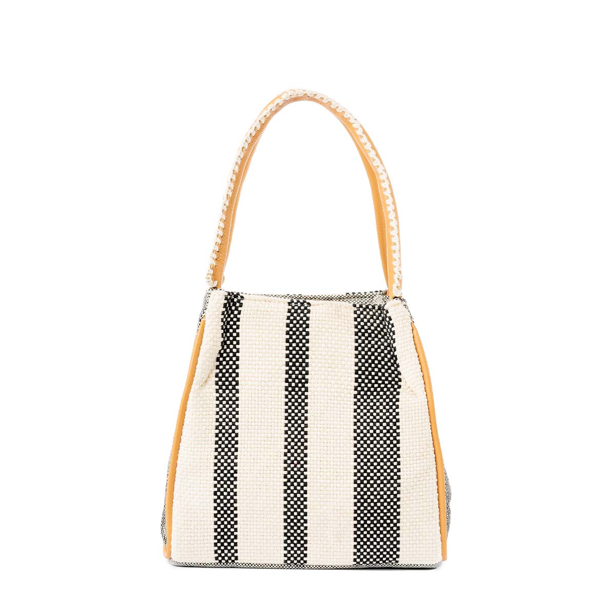 Back of the hand woven artisan Flora Petite Tote in Tourmaline pattern. It has vertical white and black stripes. It has a leather handle with white embroidery. 