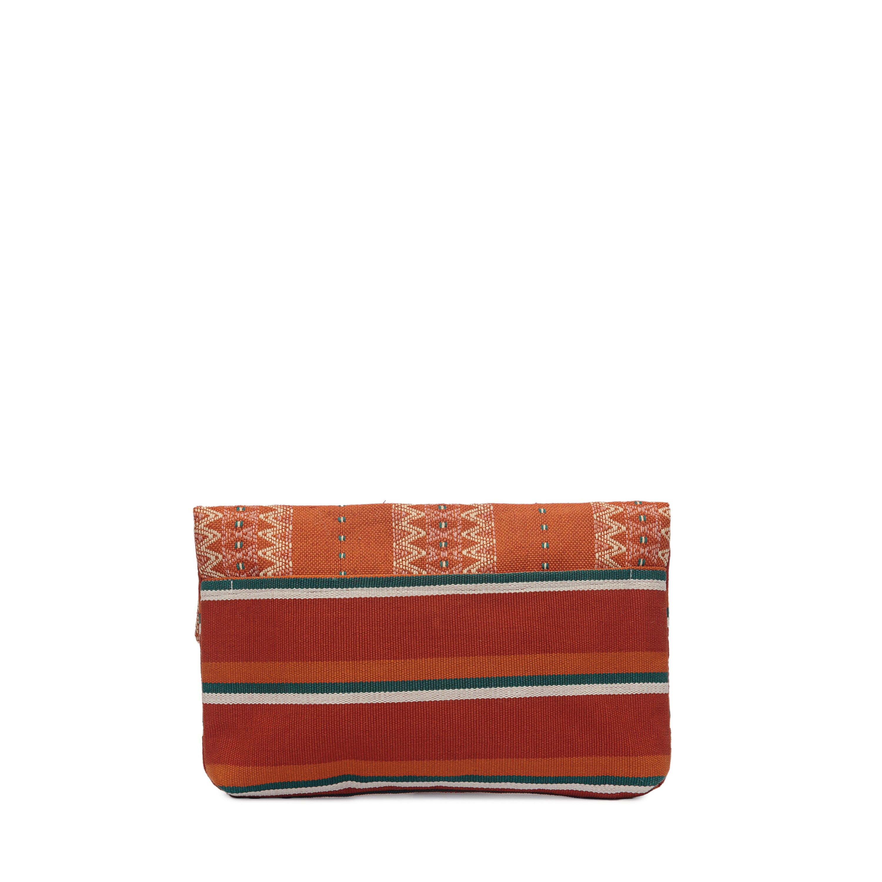The back view of the hand woven artisan Celia Clutch in Ginger color. The back shows where the two fabrics meet, one with a red and green vertical striped fabric, and the other with a zigzag yellow and orange pattern. 