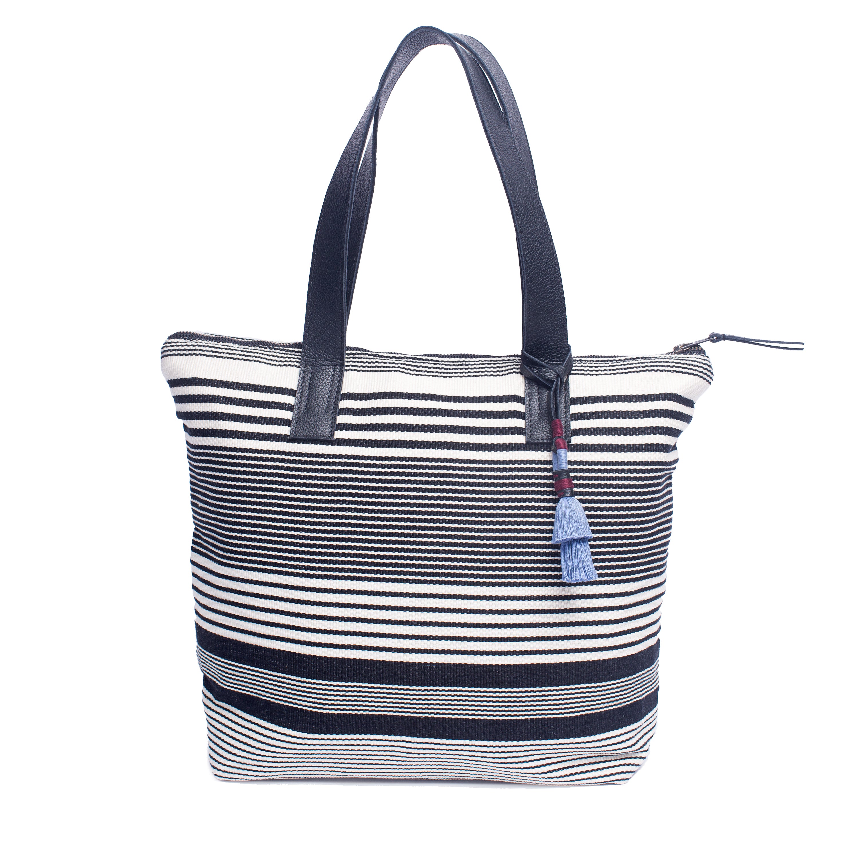Angela  Handwoven artisan Angela Tote in Black White Stripes. It has leather handles and a light blue tassel.