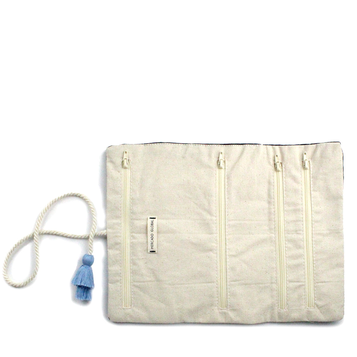 Hand Woven Artisan Lilia Jewelry Denim Roll. It is displayed open showing four zippered pockets. The white cord and blue tassel are attached to the top of the jewelery roll. It has a beige lining fabric.