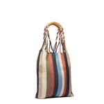 Side angle view of the Apolonia Tote in Blue Canyon.