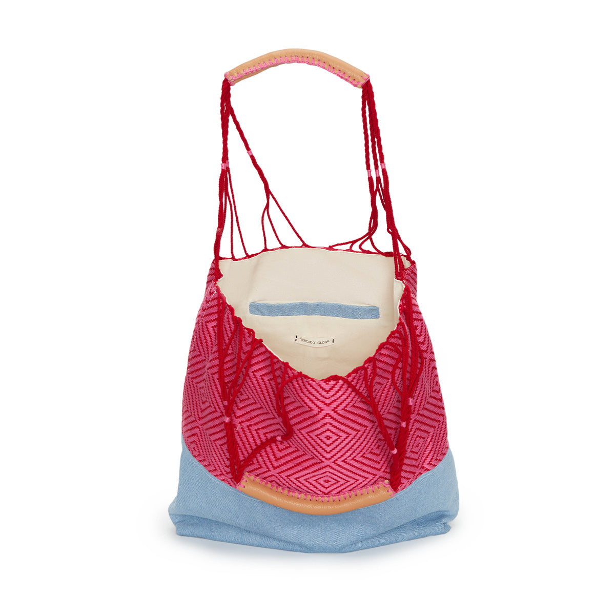 An open view of the Apolonia Tote in Raspberry.